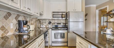 Condo, 2 Bedrooms | Private kitchen | Fridge, microwave, oven, dishwasher