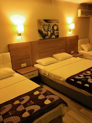 Deluxe Family | Minibar, in-room safe, blackout drapes, soundproofing
