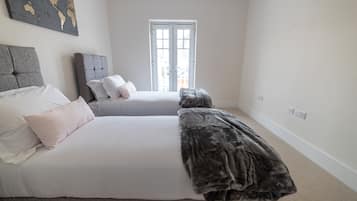 2 bedrooms, individually decorated, blackout drapes, soundproofing