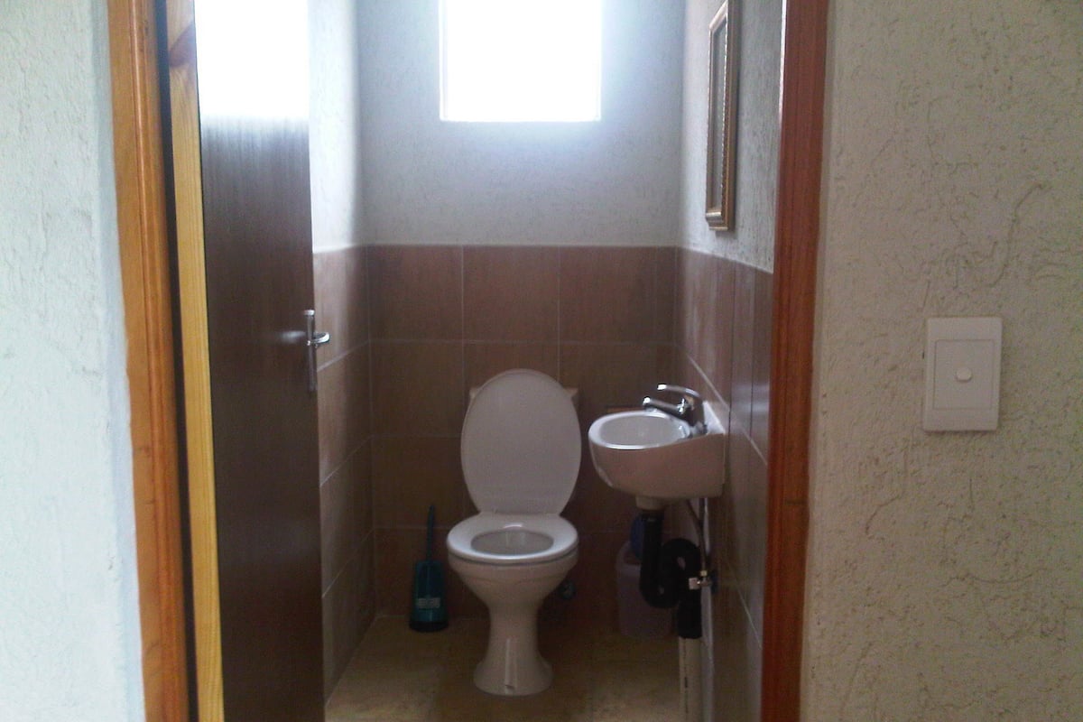 Double Room, Private Bathroom | Blackout drapes, iron/ironing board, free WiFi, bed sheets