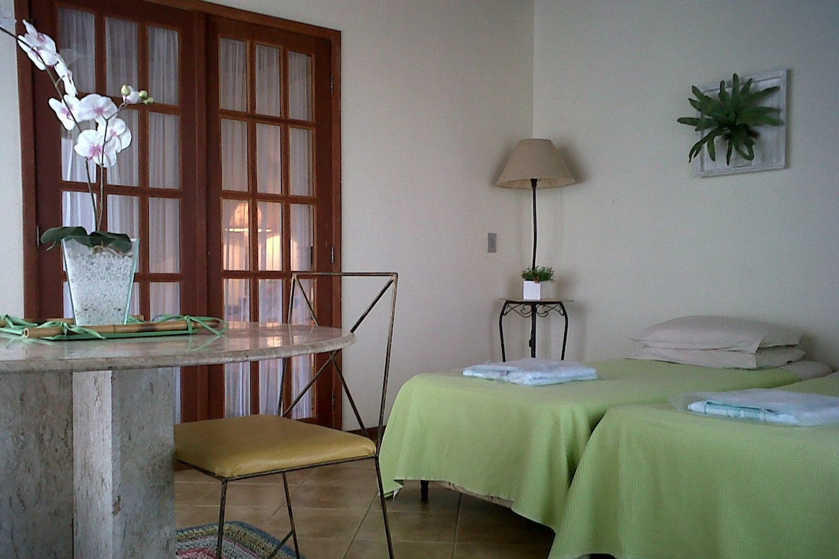 Deluxe Quadruple Room | Minibar, desk, blackout drapes, free WiFi