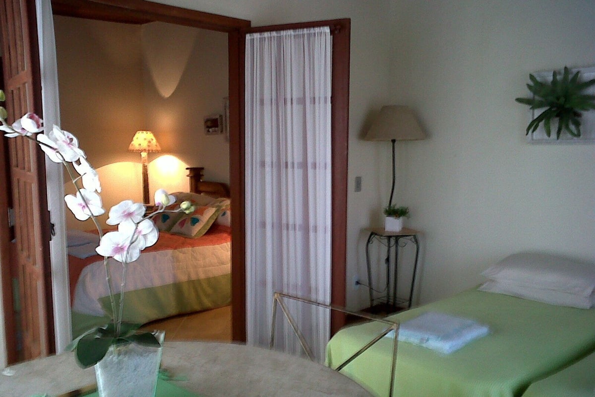 Deluxe Quadruple Room | Minibar, desk, blackout drapes, free WiFi