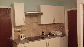 Apartment, 1 Bedroom | Private kitchen | Full-size fridge, microwave, stovetop, electric kettle