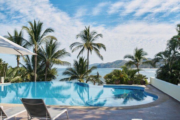 Outdoor pool, pool umbrellas, pool loungers