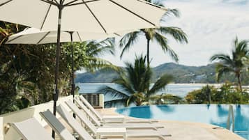 Outdoor pool, pool umbrellas, pool loungers