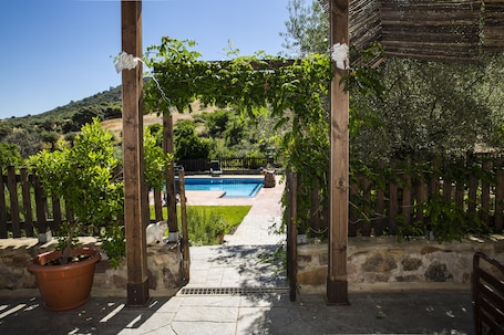 Seasonal outdoor pool, pool loungers. Casa Rural La Huerta De Los Nogales