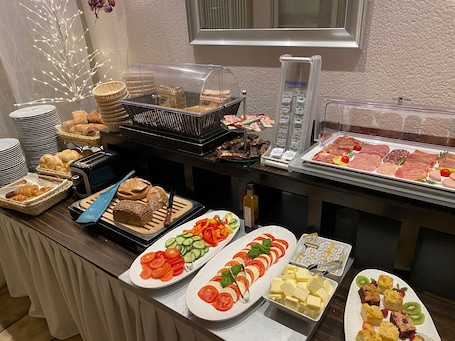 Daily buffet breakfast (EUR 14 per person)