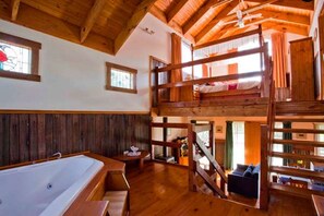 Honeymoon Cottage | Blackout drapes, iron/ironing board, bed sheets