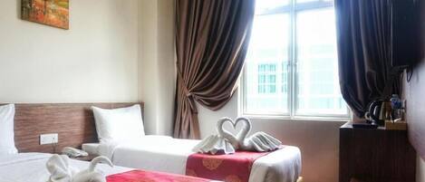 Camera Standard con 2 letti singoli | Una scrivania, postazione laptop, ferro/asse da stiro, Wi-Fi gratuito