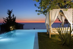 Outdoor pool, pool umbrellas, pool loungers