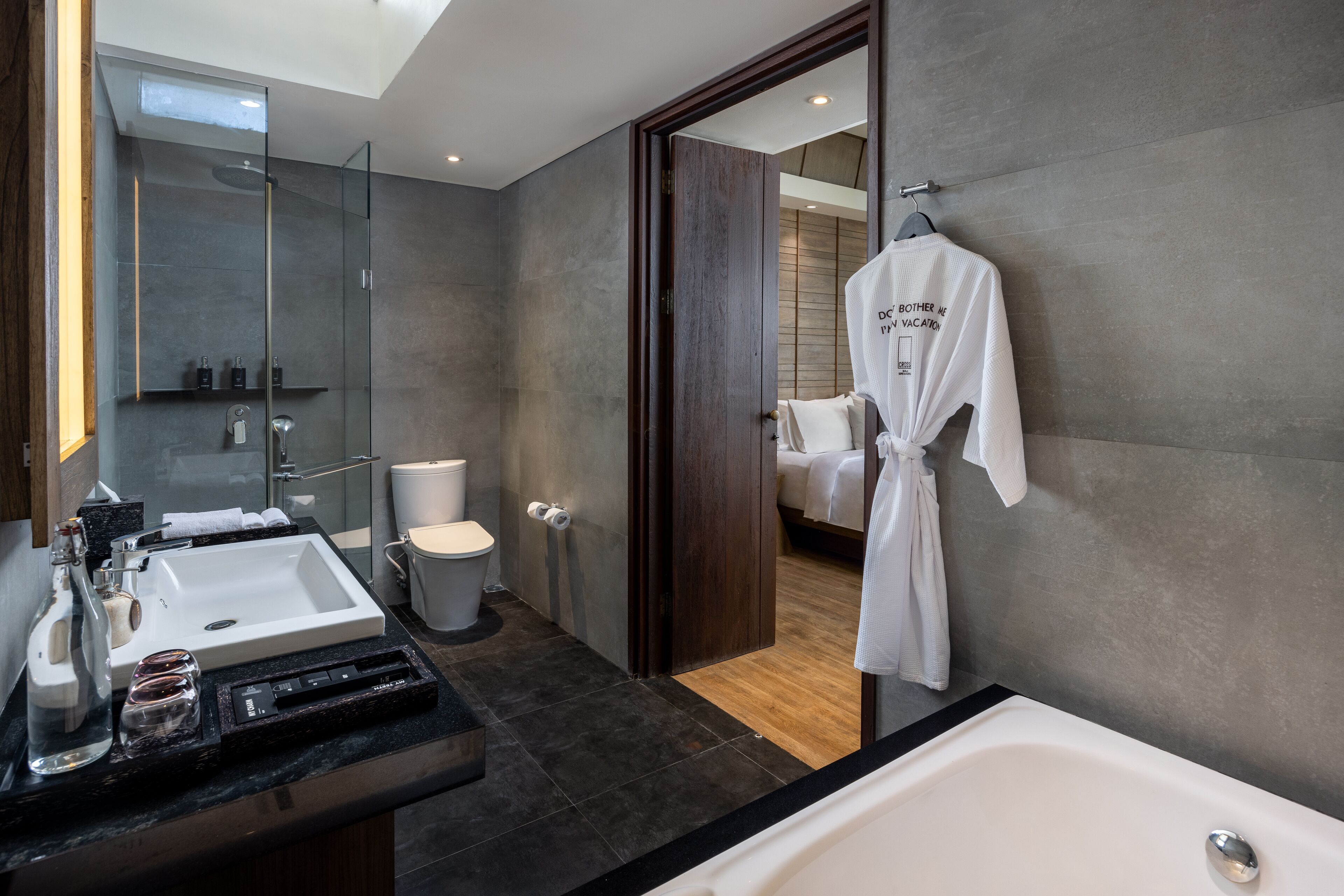 deluxe villa, 2 bedrooms, private pool | bathroom | separate bathtub and shower, rainfall showerhead, free toiletries