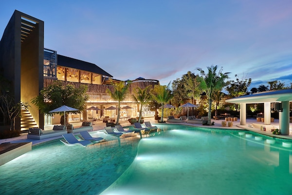 3 outdoor pools, open 9 AM to 9 PM, pool loungers