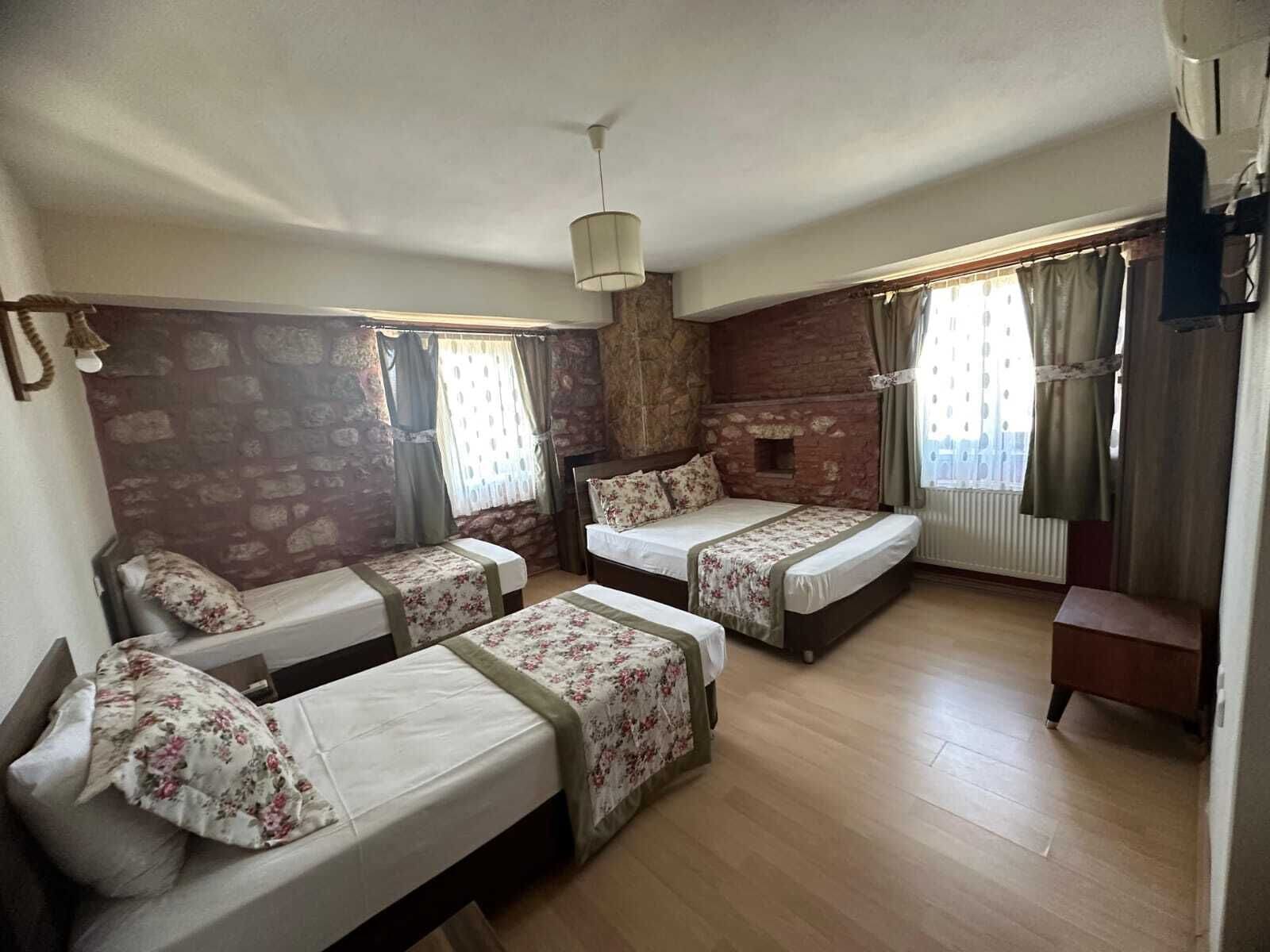 standard quadruple room | blackout curtains, free wifi, bed sheets