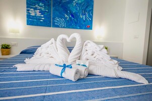 Ropa de cama de alta calidad y minibar