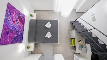 Chambre Quadruple | Literie de qualité supérieure, minibar, coffres-forts dans les chambres