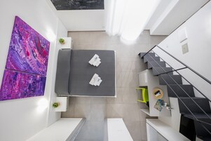 Quadruple Room | Premium bedding, minibar, in-room safe, individually decorated