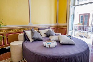 Suite exclusiva | Ropa de cama de alta calidad, minibar, caja fuerte