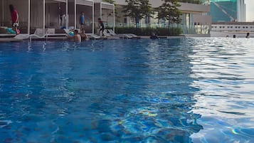 Outdoor pool, open 9:00 AM to 5:00 PM, pool umbrellas, pool loungers