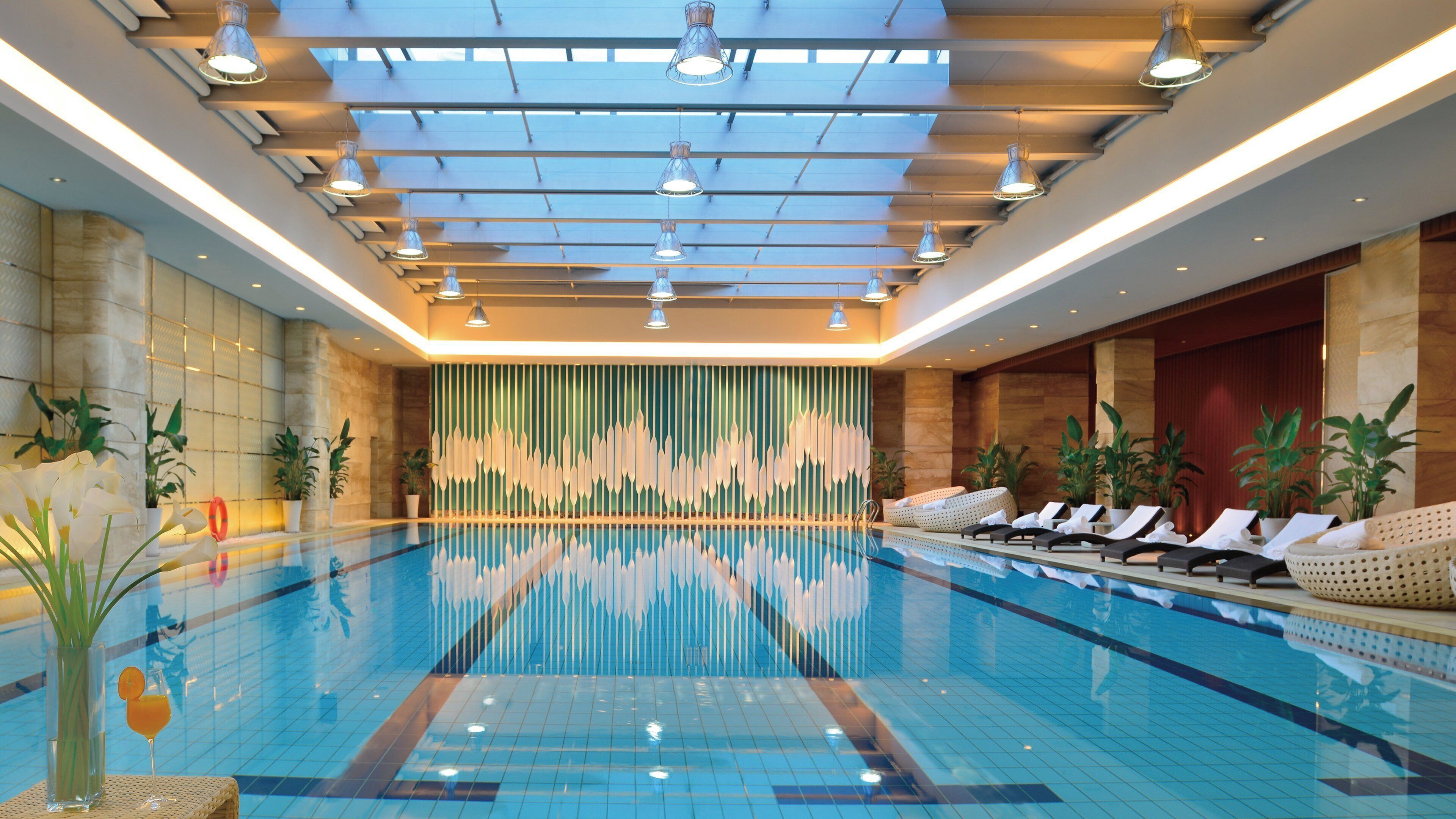 Indoor pool, open 8 AM to 8 PM, pool loungers