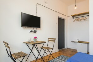 32-inch flat-screen TV with cable channels, TV