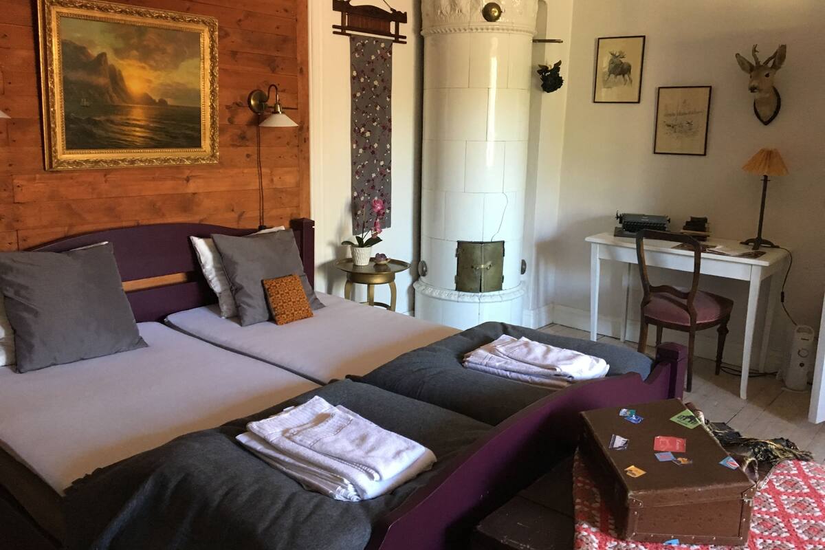Apartment, 2 Bedrooms | Desk, iron/ironing board (on request), individually decorated