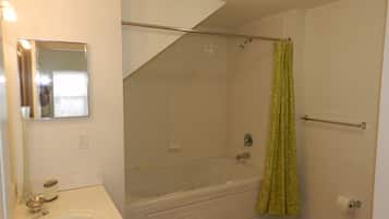 Family Townhome, Garden Area | Bathroom | Combined shower/tub, rainfall showerhead, hair dryer, towels