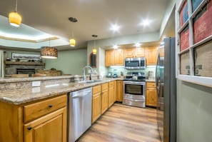 Stovetop, dishwasher, cookware/dishes/utensils, dining tables