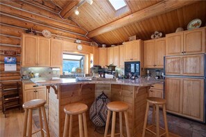 Stovetop, dishwasher, cookware/dishes/utensils, dining tables - Links and Logs Chalet (Steamboat Springs)
