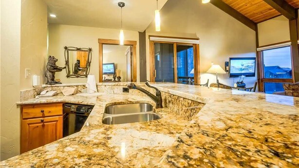 Stovetop, dishwasher, cookware/dishes/utensils, dining table - Lodge C 303 (Steamboat Springs)