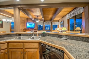 Stovetop, dishwasher, cookware/dishes/utensils, dining tables