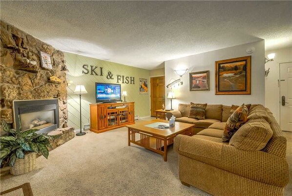 Flat-screen TV, fireplace