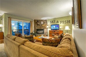 Flat-screen TV, fireplace