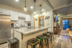 Stovetop, dishwasher, cookware/dishes/utensils, dining tables