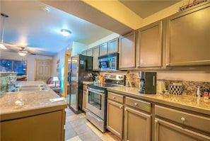 Stovetop, dishwasher, cookware/dishes/utensils, dining tables - Residences At Old Town C4 (Steamboat Springs)