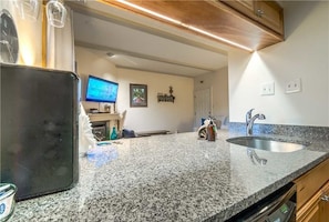 Stovetop, dishwasher, cookware/dishes/utensils, dining tables - Rockies 2428 (Steamboat Springs)