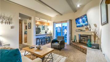 Flat-screen TV, fireplace