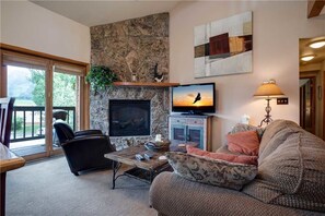 Flat-screen TV, fireplace