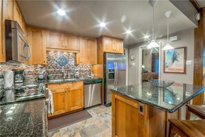 Stovetop, dishwasher, cookware/dishes/utensils, dining tables