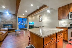 Flat-screen TV, fireplace