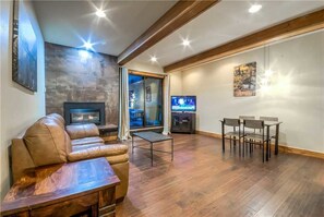 Flat-screen TV, fireplace