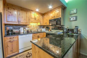 Stovetop, dishwasher, cookware/dishes/utensils, dining tables