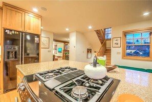 Stovetop, dishwasher, cookware/dishes/utensils, dining tables