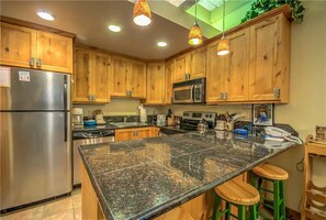 Stovetop, dishwasher, cookware/dishes/utensils, dining tables