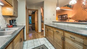 Stovetop, dishwasher, cookware/dishes/utensils, dining tables - Timber Run 111 (Steamboat Springs)