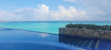 2 outdoor pools, open 9 AM to 9 PM, pool umbrellas, sun loungers