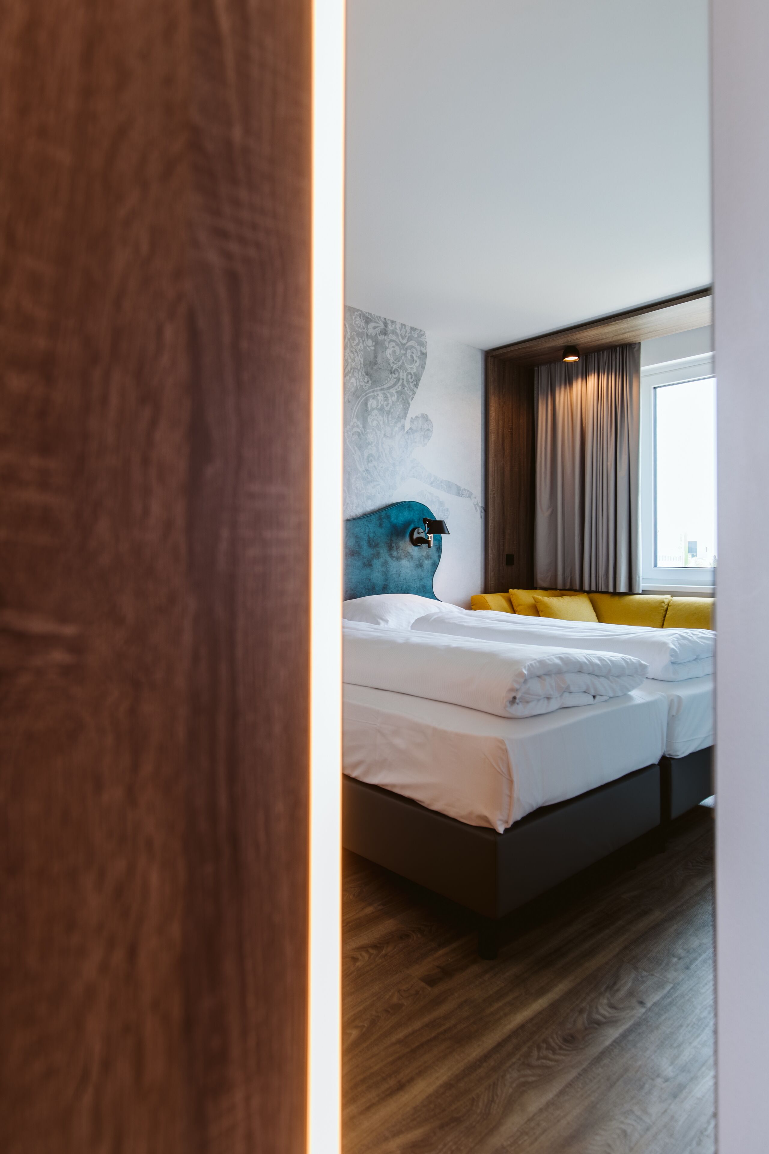 standard triple room | 1 bedroom, in-room safe, desk, blackout curtains