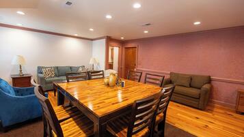 Elite Apartment, Multiple Beds, Non Smoking | Living area | Flat-screen TV