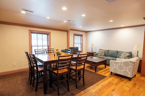 Elite Apartment, Multiple Beds, Non Smoking | Living area | Flat-screen TV - Howard's Creek Inn (White Sulphur Springs)