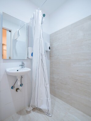 Shower, free toiletries, hair dryer, towels