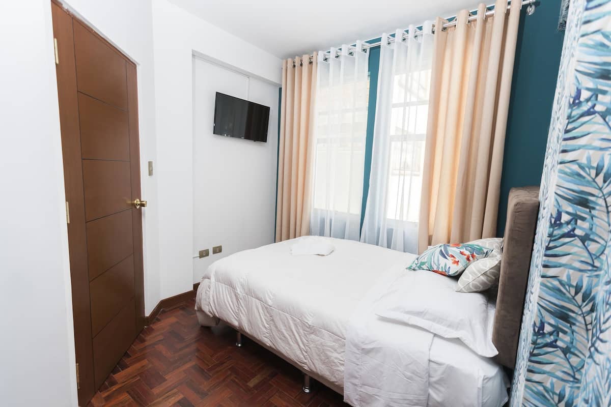 Premium bedding, down duvets, Tempur-Pedic beds, blackout curtains
